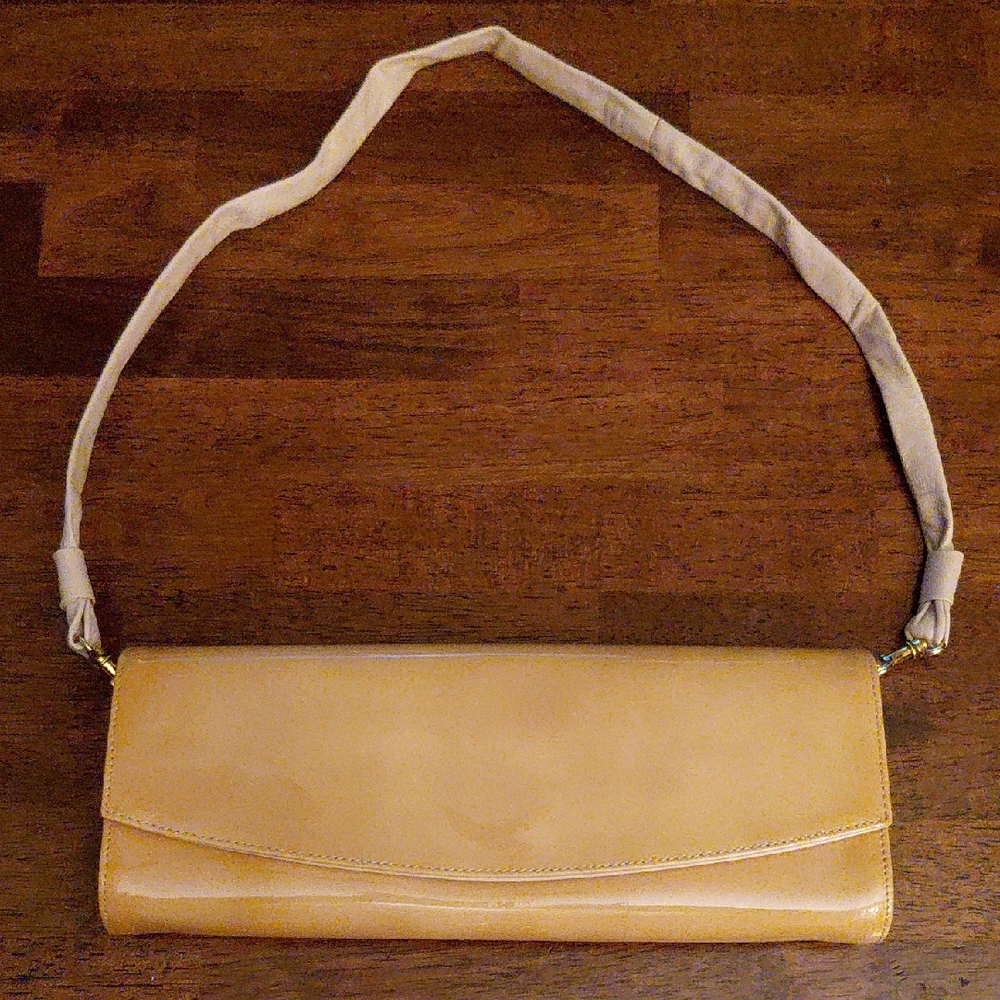Stuart Weizman Elegant Tan Leather Clutch